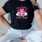 Don’t care bear-Graphic Tee- Simply Simpson's Boutique is a Women's Online Fashion Boutique Located in Jupiter, Florida