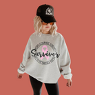 Survivor-Graphic Tee- Simply Simpson's Boutique is a Women's Online Fashion Boutique Located in Jupiter, Florida