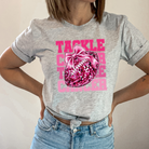 Tackle cancer-Graphic Tee- Simply Simpson's Boutique is a Women's Online Fashion Boutique Located in Jupiter, Florida