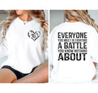 Everyones fighting a battle-Graphic Tee- Simply Simpson's Boutique is a Women's Online Fashion Boutique Located in Jupiter, Florida