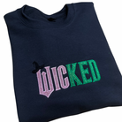 Wicked movie embroidery and glitter-Graphic Tee- Simply Simpson's Boutique is a Women's Online Fashion Boutique Located in Jupiter, Florida