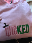 Wicked movie embroidery and glitter-Graphic Tee- Simply Simpson's Boutique is a Women's Online Fashion Boutique Located in Jupiter, Florida