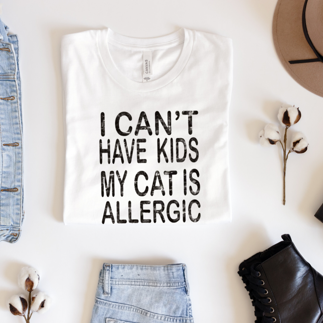 I can’t have kids my cats allergic-Graphic Tee- Simply Simpson's Boutique is a Women's Online Fashion Boutique Located in Jupiter, Florida