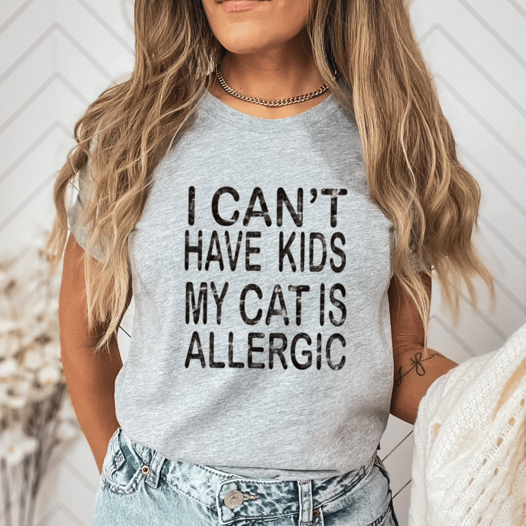 I can’t have kids my cats allergic-Graphic Tee- Simply Simpson's Boutique is a Women's Online Fashion Boutique Located in Jupiter, Florida